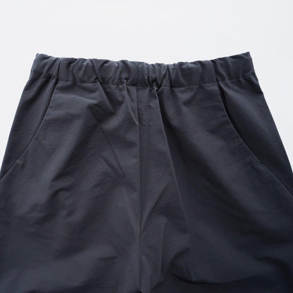 ONE TUCK TAPERED STRETCH PANTS