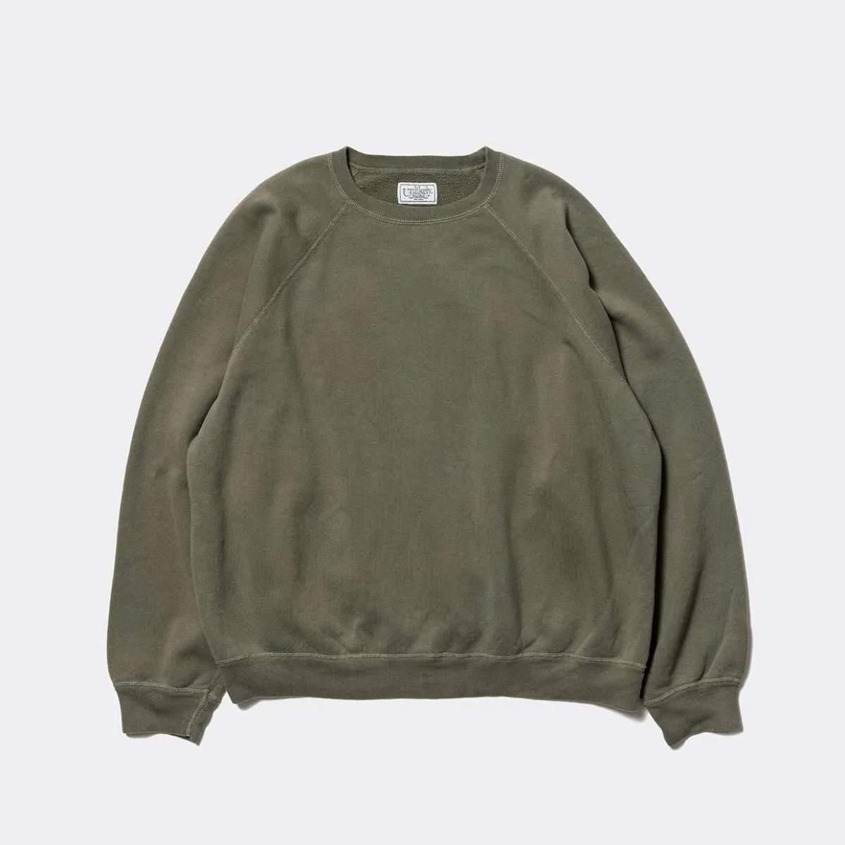 UNLIKELY RAGLAN SLEEVE CREW